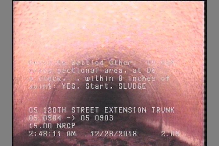 Deposits Settled Other, 15 %of cross sectional area, at 06 o'clock, , within 8 inches of joint: YES, Start - SLUDGE