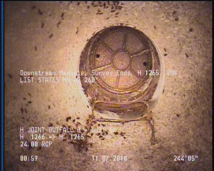 Downstream Manhole, Survey Ends - H 1265. RUN LIST STATES MH AT 268'