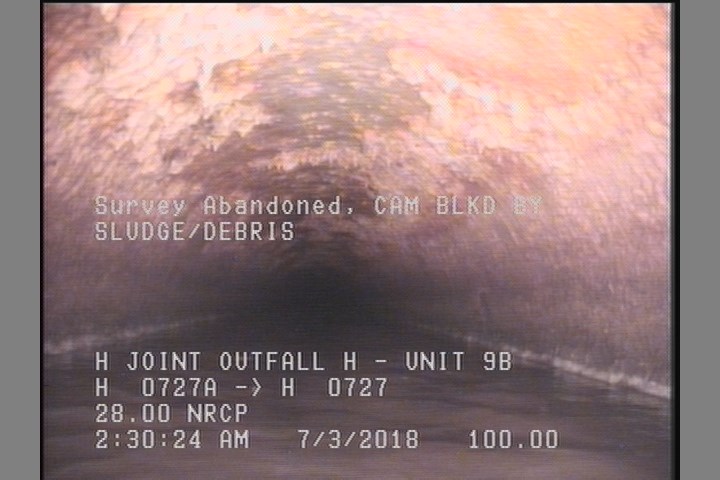 Survey Abandoned - CAM BLKD BY SLUDGE/DEBRIS