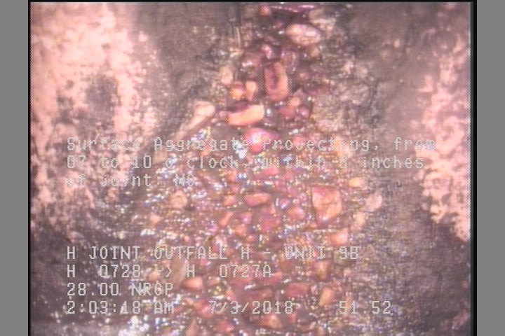 Surface Aggregate Projecting, from 07 to 10 o'clock, within 8 inches of joint: NO