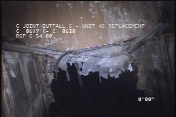 General Observation - WOOD PLANKS OVER DOWNSTREAM PIPE