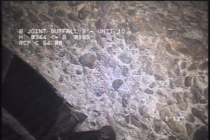 Surface Aggregate Projecting, from 09 to 03 o'clock, within 8 inches of joint: NO - SEVERE AGG