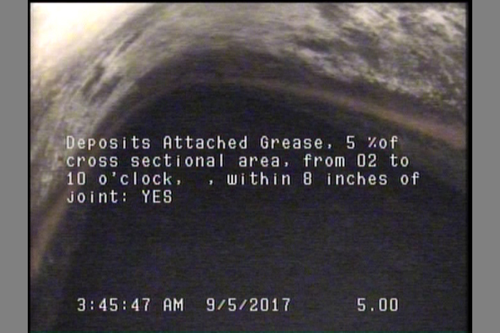 Deposits Attached Grease, 5 %of cross sectional area, from 02 to 10 o'clock, , within 8 inches of joint: YES