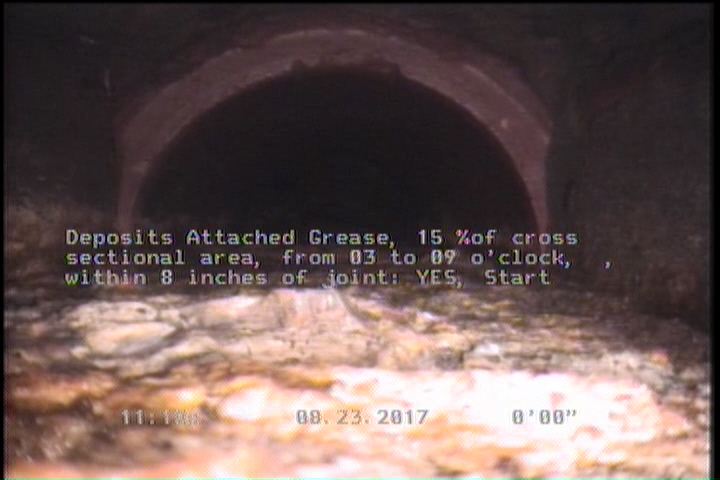 Deposits Attached Grease, 15 %of cross sectional area, from 03 to 09 o'clock, , within 8 inches of joint: YES, Start