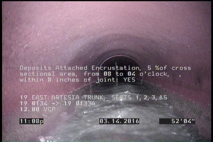Deposits Attached Encrustation, 5 %of cross sectional area, from 08 to 04 o'clock, , within 8 inches of joint: YES