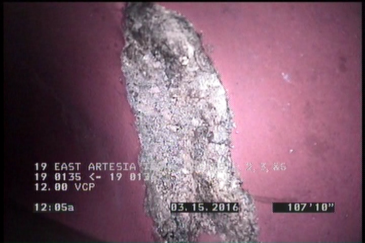 Deposits Attached Encrustation, 10 %of cross sectional area, from 01 to 04 o'clock, , within 8 inches of joint: YES