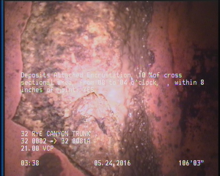 Deposits Attached Encrustation, 10 %of cross sectional area, from 08 to 04 o'clock, , within 8 inches of joint: YES