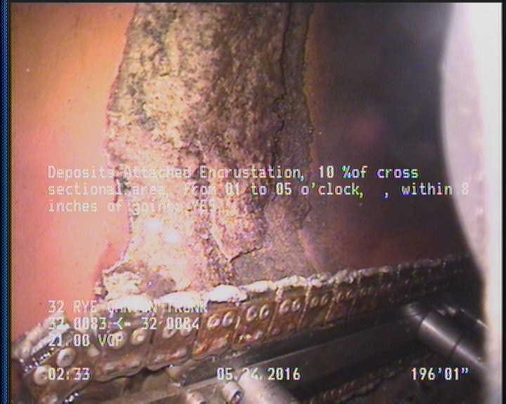 Deposits Attached Encrustation, 10 %of cross sectional area, from 01 to 05 o'clock, , within 8 inches of joint: YES