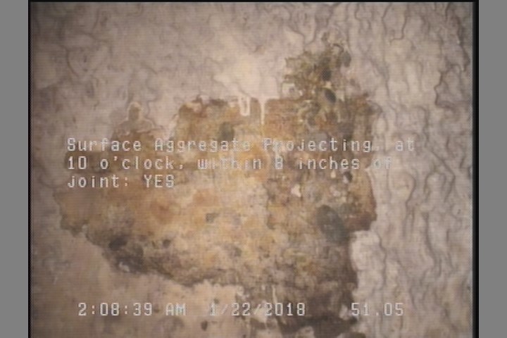 Surface Aggregate Projecting, at 10 o'clock, within 8 inches of joint: YES