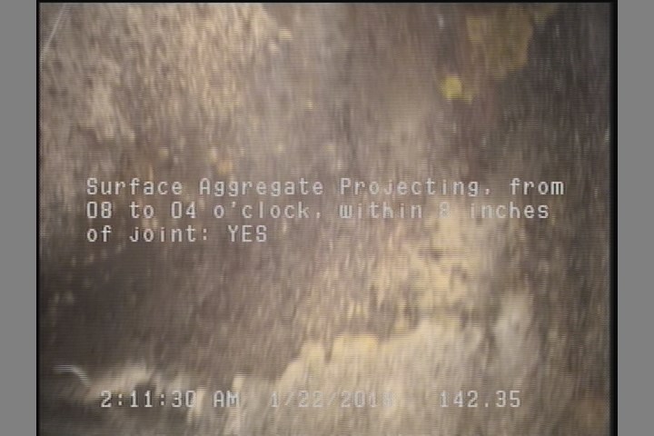 Surface Aggregate Projecting, from 08 to 04 o'clock, within 8 inches of joint: YES