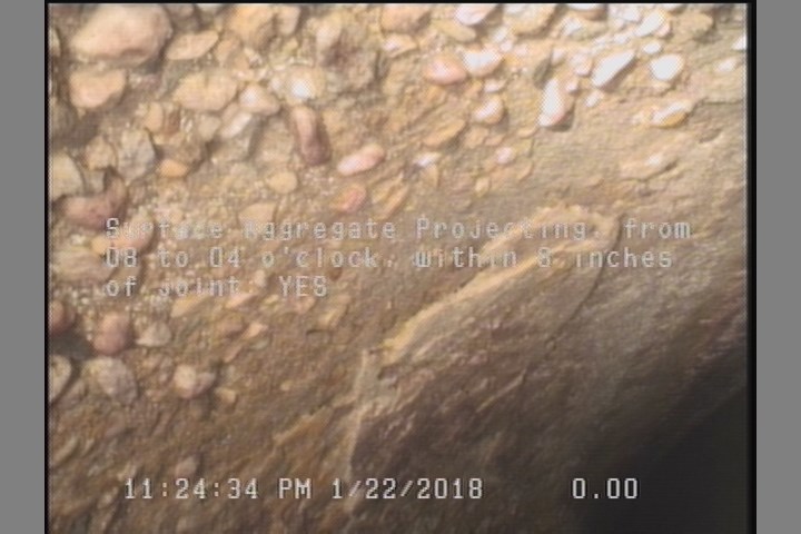 Surface Aggregate Projecting, from 08 to 04 o'clock, within 8 inches of joint: YES