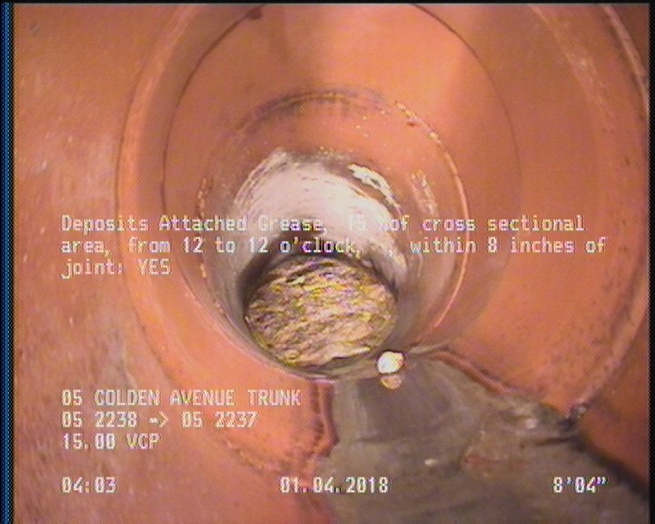 Deposits Attached Grease, 15 %of cross sectional area, from 12 to 12 o'clock, , within 8 inches of joint: YES