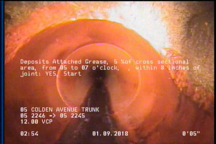 Deposits Attached Grease, 5 %of cross sectional area, from 05 to 07 o'clock, , within 8 inches of joint: YES, Start