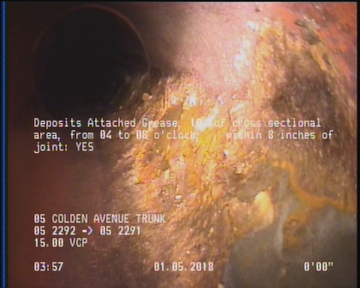 Deposits Attached Grease, 10 %of cross sectional area, from 04 to 08 o'clock, , within 8 inches of joint: YES