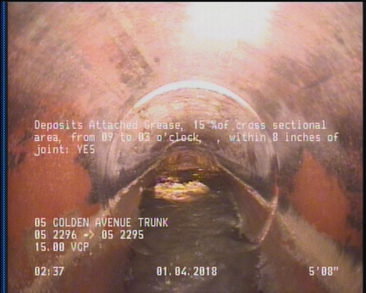 Deposits Attached Grease, 15 %of cross sectional area, from 09 to 03 o'clock, , within 8 inches of joint: YES