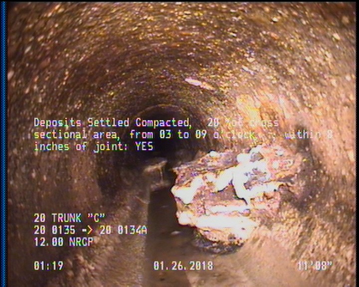 Deposits Settled Compacted, 20 %of cross sectional area, from 03 to 09 o'clock, , within 8 inches of joint: YES