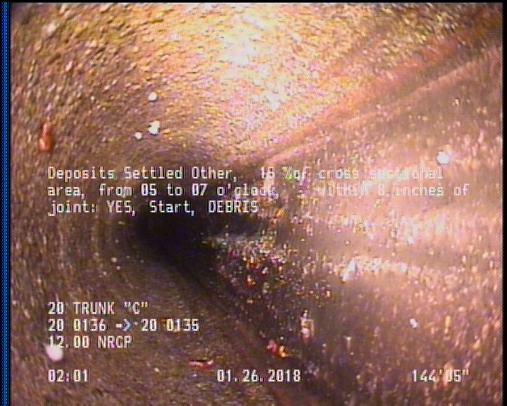 Deposits Settled Other, 15 %of cross sectional area, from 05 to 07 o'clock, , within 8 inches of joint: YES, Start - DEBRIS