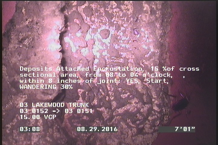 Deposits Attached Encrustation, 15 %of cross sectional area, from 08 to 04 o'clock, , within 8 inches of joint: YES, Start - WANDERING 30%