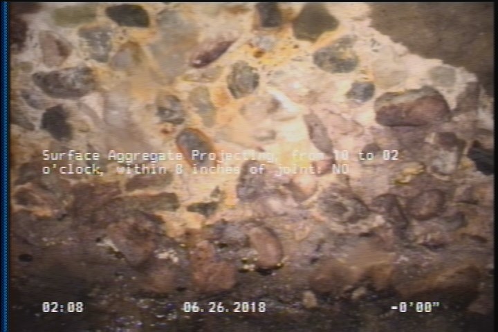 Surface Aggregate Projecting, from 10 to 02 o'clock, within 8 inches of joint: NO
