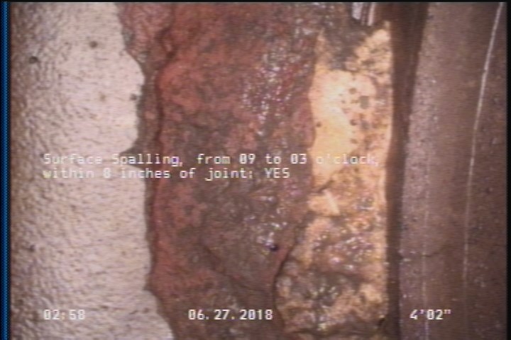 Surface Spalling, from 09 to 03 o'clock, within 8 inches of joint: YES