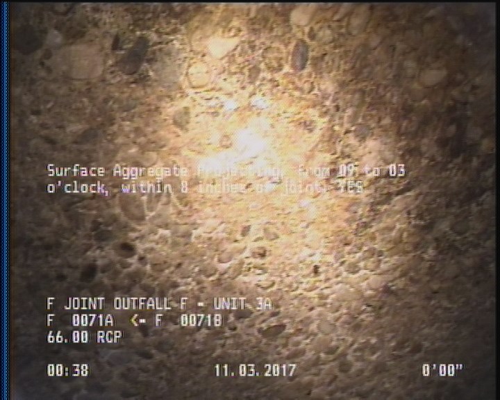 Surface Aggregate Projecting, from 09 to 03 o'clock, within 8 inches of joint: YES