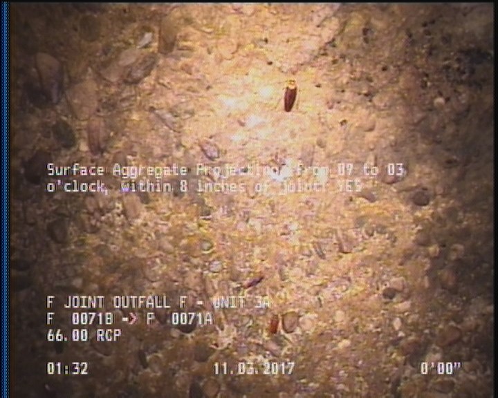 Surface Aggregate Projecting, from 09 to 03 o'clock, within 8 inches of joint: YES
