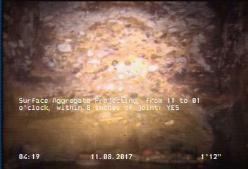 Surface Aggregate Projecting, from 11 to 01 o'clock, within 8 inches of joint: YES