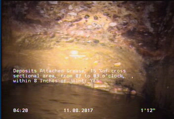 Deposits Attached Grease, 15 %of cross sectional area, from 09 to 03 o'clock, , within 8 inches of joint: YES