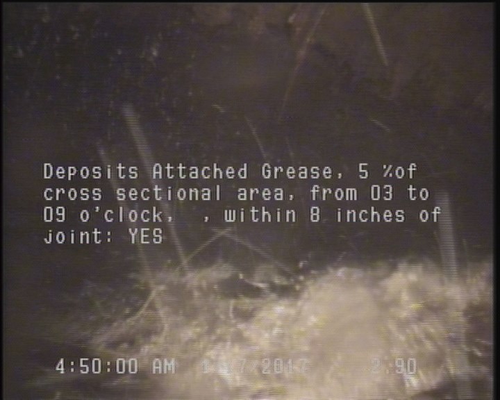 Deposits Attached Grease, 5 %of cross sectional area, from 03 to 09 o'clock, , within 8 inches of joint: YES