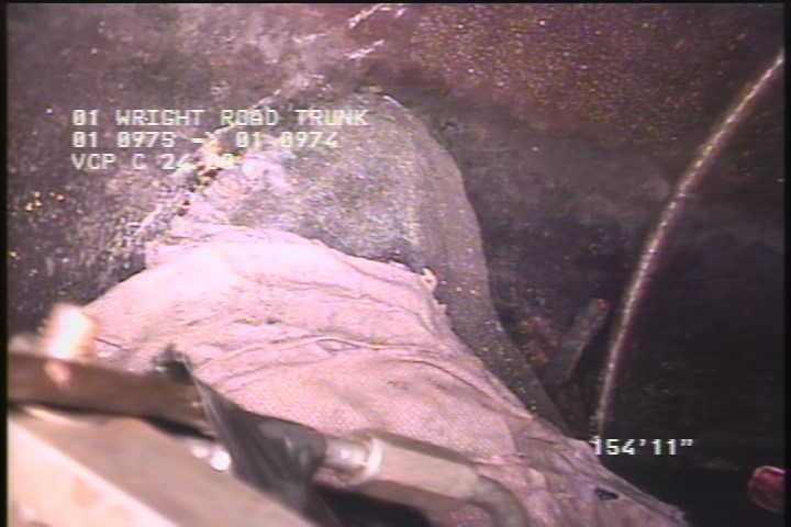 Deposits Settled Other, 15 %of cross sectional area, from 06 to 08 o'clock, , within 8 inches of joint: YES - POSSIBLE BROKEN PIPE SECTION