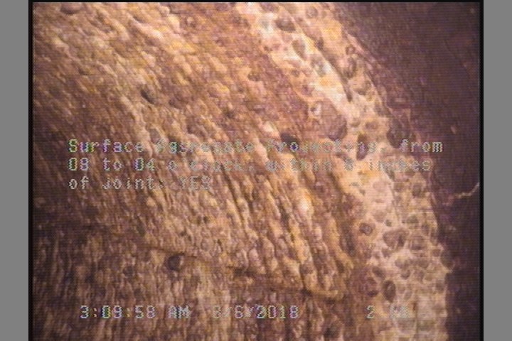Surface Aggregate Projecting, from 08 to 04 o'clock, within 8 inches of joint: YES