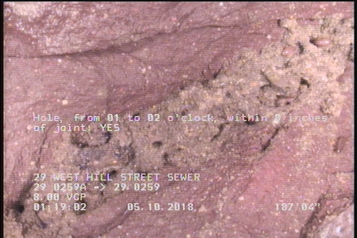 Hole, from 01 to 02 o'clock, within 8 inches of joint: YES