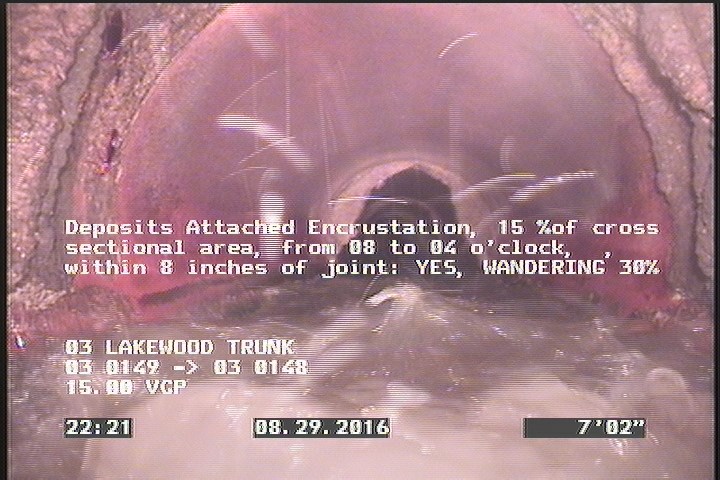 Deposits Attached Encrustation, 15 %of cross sectional area, from 08 to 04 o'clock, , within 8 inches of joint: YES - WANDERING 30%