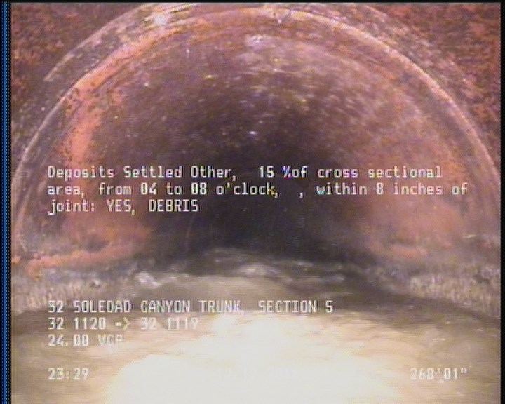Deposits Settled Other, 15 %of cross sectional area, from 04 to 08 o'clock, , within 8 inches of joint: YES, Start - DEBRIS
