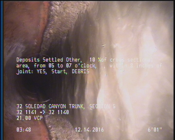 Deposits Settled Other, 10 %of cross sectional area, from 05 to 07 o'clock, , within 8 inches of joint: YES, Start - DEBRIS