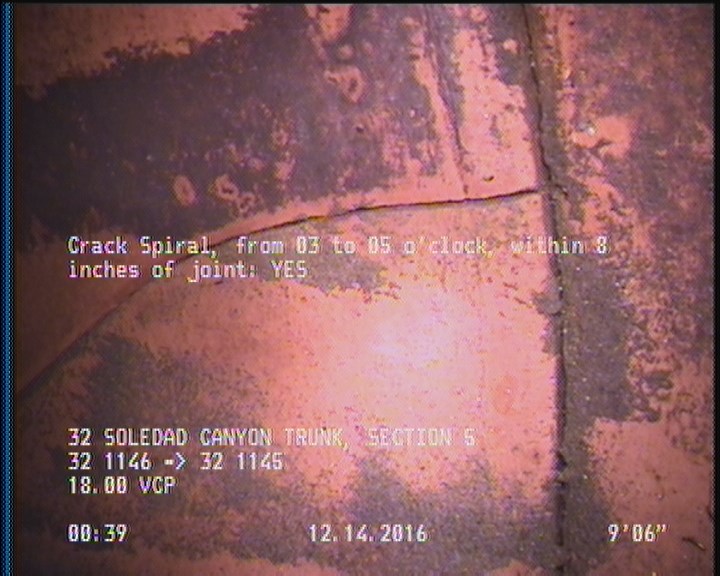 Crack Spiral, from 03 to 05 o'clock, within 8 inches of joint: YES