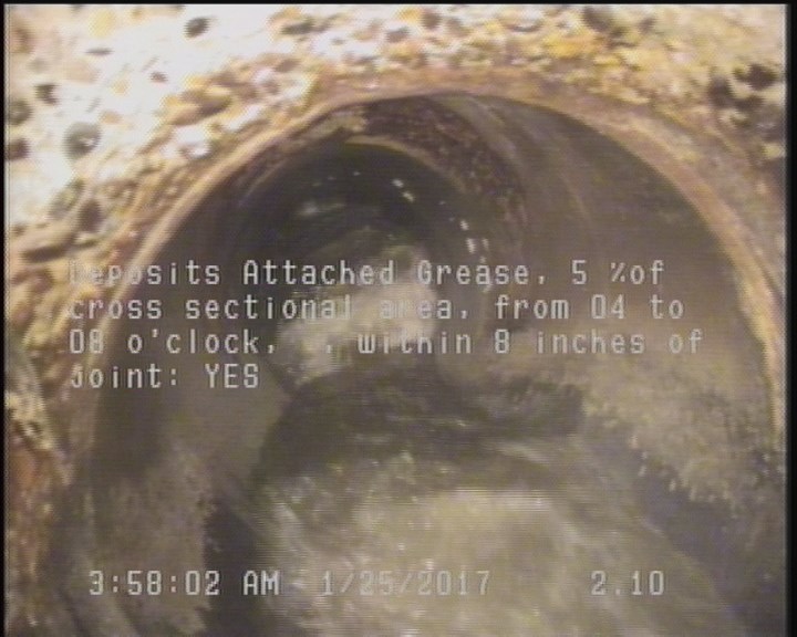 Deposits Attached Grease, 5 %of cross sectional area, from 04 to 08 o'clock, , within 8 inches of joint: YES
