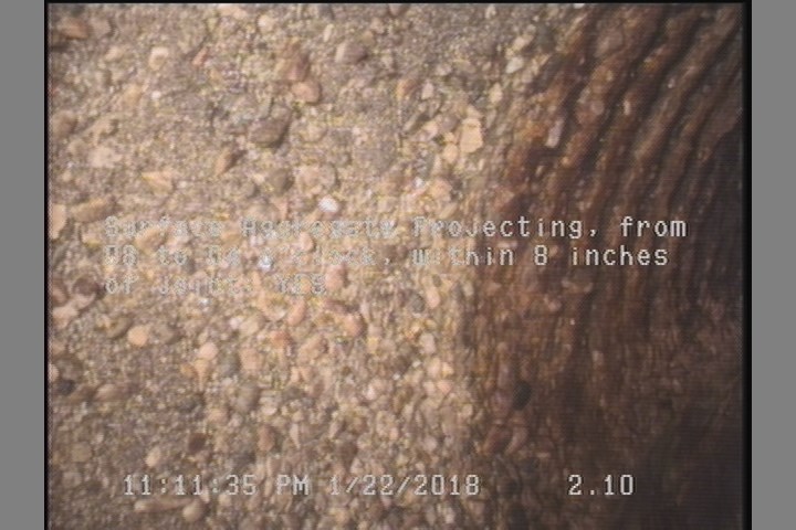 Surface Aggregate Projecting, from 08 to 04 o'clock, within 8 inches of joint: YES