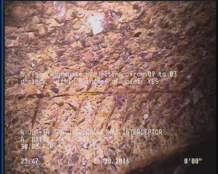 Surface Aggregate Projecting, from 09 to 03 o'clock, within 8 inches of joint: YES