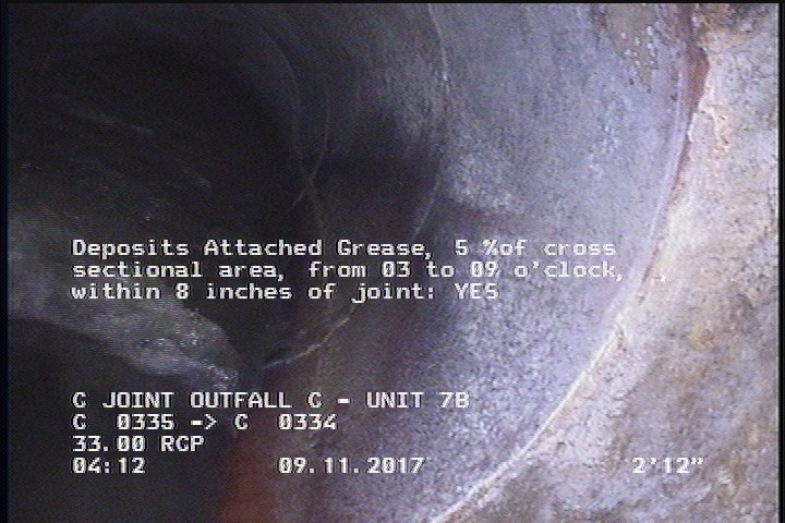 Deposits Attached Grease, 5 %of cross sectional area, from 03 to 09 o'clock, , within 8 inches of joint: YES