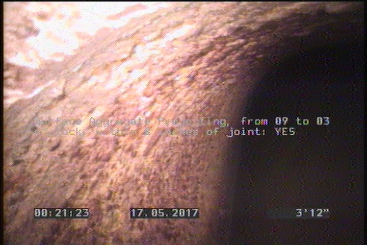 Surface Aggregate Projecting, from 09 to 03 o'clock, within 8 inches of joint: YES